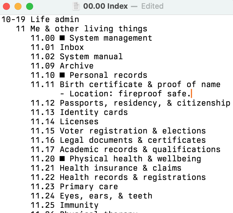 Screenshot of a text file. The first line is our area called 10-19 Life admin. Below that, indented, is the category called 11 Me & other living things. And below that, indented again, are our IDs, one per row.